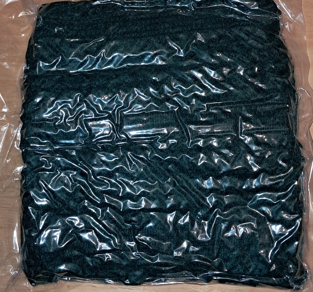 BLANKET GREEN NEW VACUUM SEALED